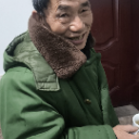 七七